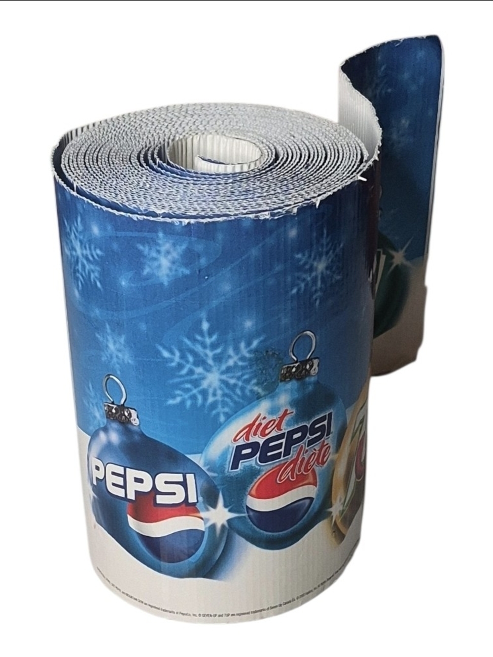 Mountain Dew Christmas Soda Roll with blue background, snowflakes, and Diet Peps